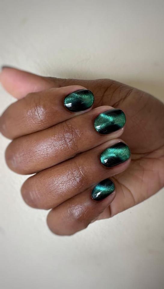 Emerald cat-eye gel manicure done at Beauty Room Kenya